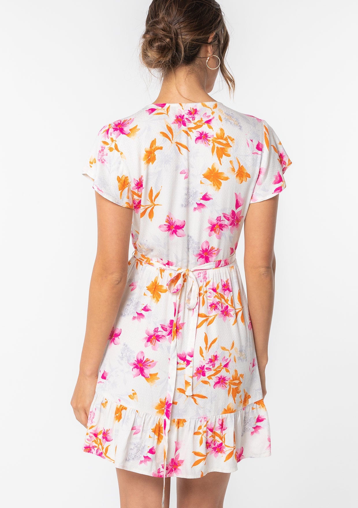 Making Moves Mini Wrap Dress